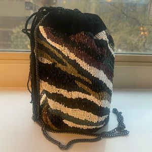 Multi color beaded bag with tassel closure from Zara. Brand new